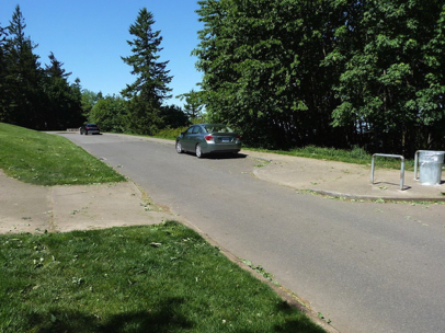 There is on-street parking around the perimeter — but there are no marked spaces